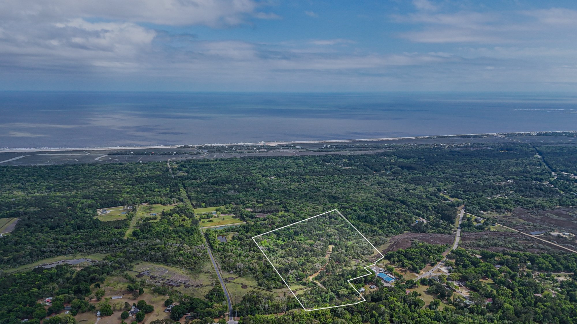 34-acre coastal land parcel on Edisto Island, South Carolina — aerial drone view